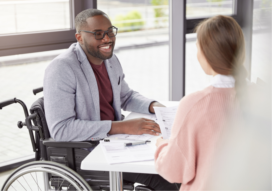 Man and woman sitting at desk together